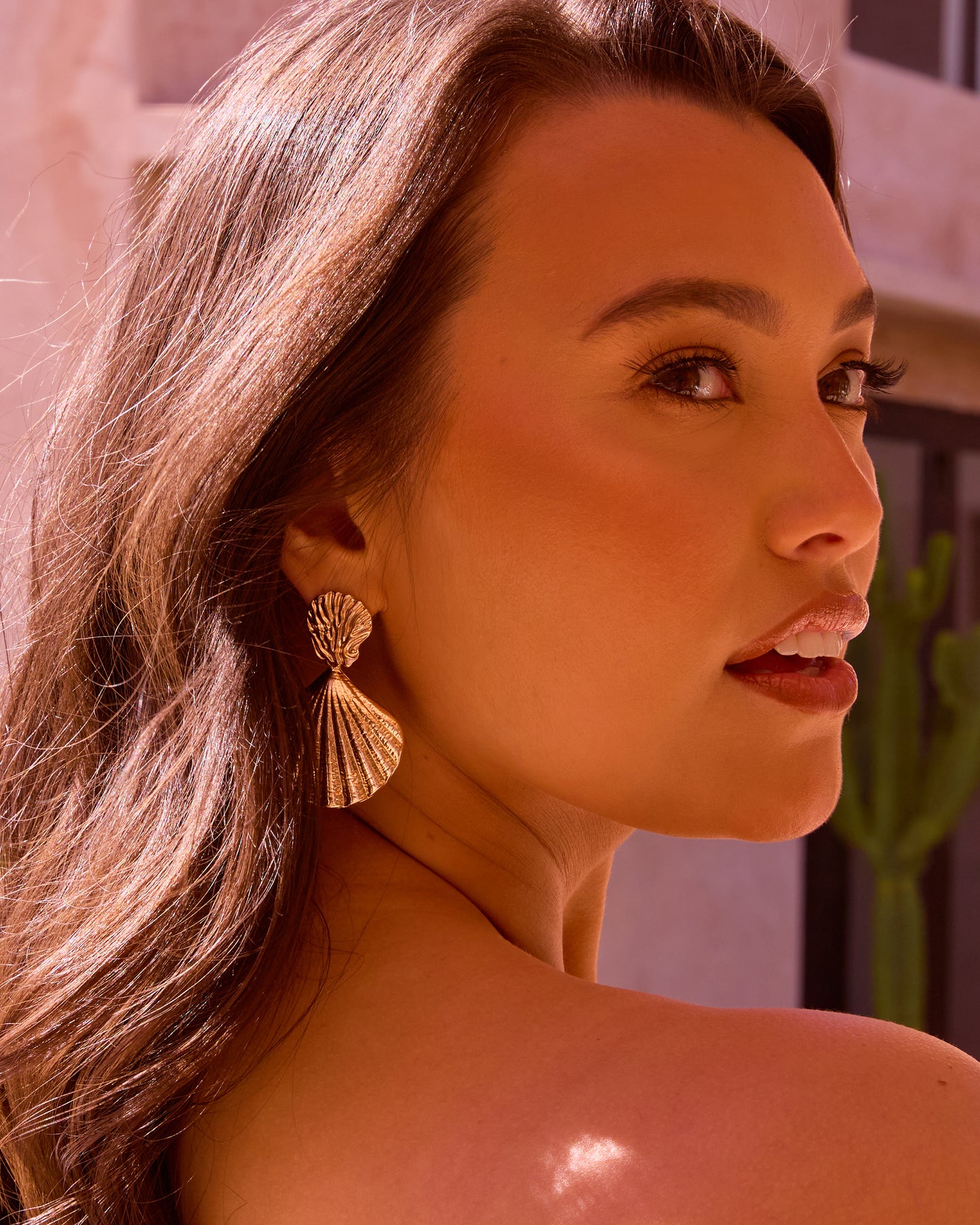 GOLD STATEMENT SHELL EARINGS